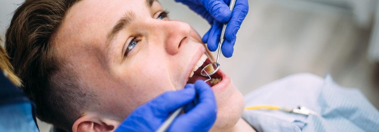 boy-at-the-dentist-consultation-checking-and-dental-treatment-in-a-clinic