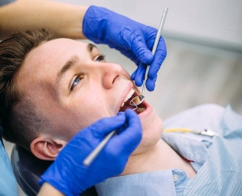 boy-at-the-dentist-consultation-checking-and-dental-treatment-in-a-clinic