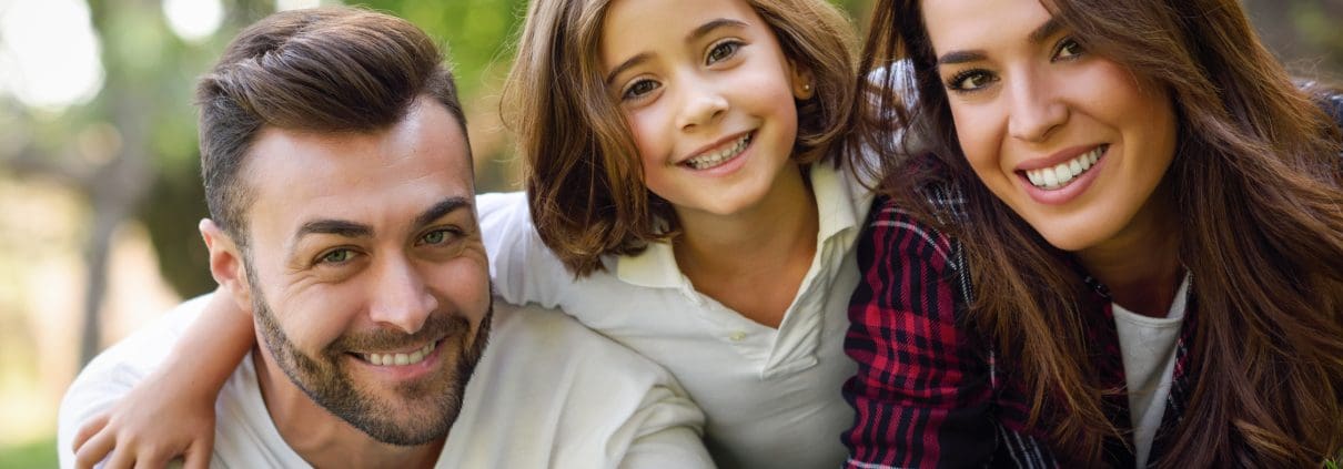 happy-young-family-in-a-urban-park